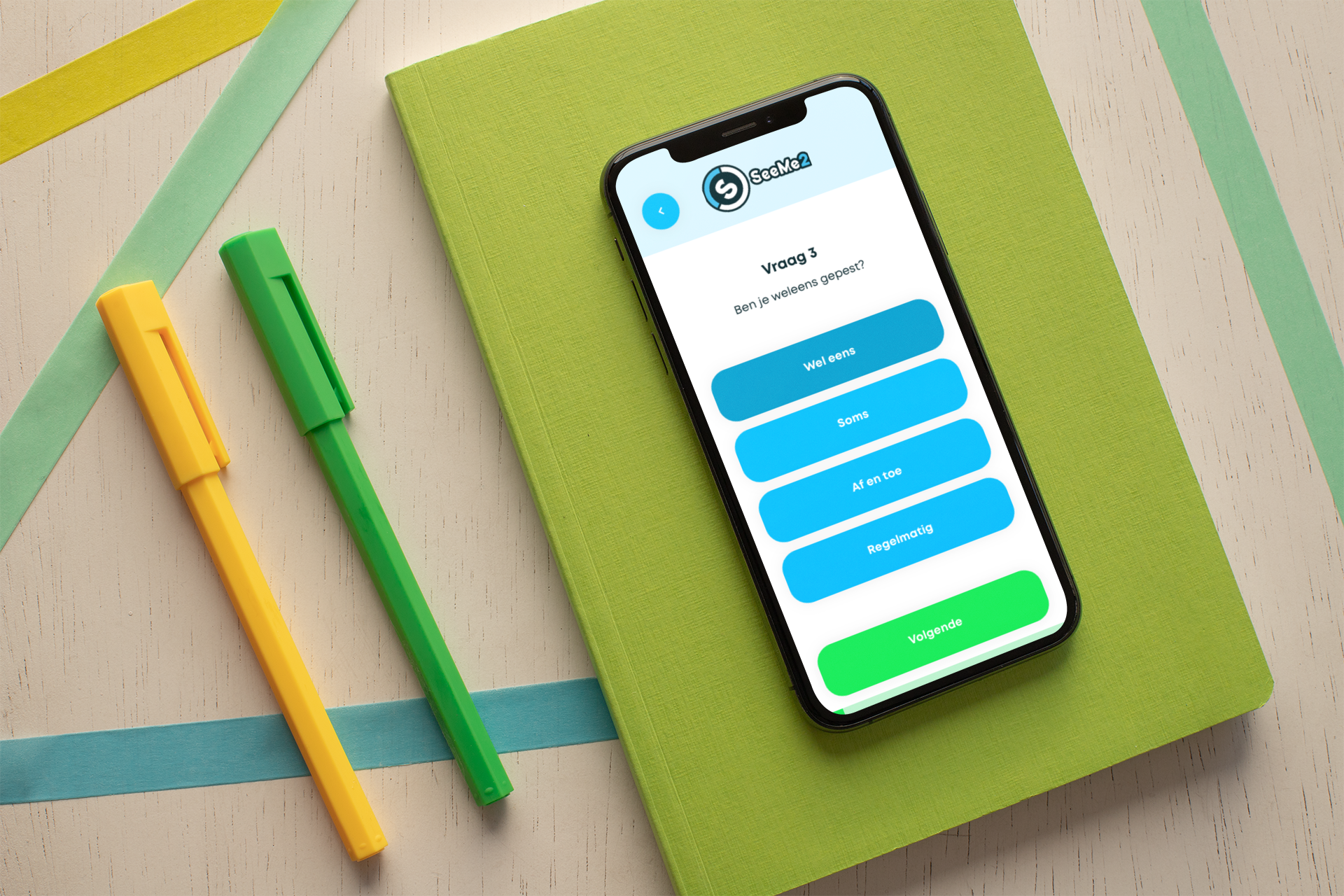 iphone-xs-mockup-with-a-desk-setup-featuring-writing-supplies-25488